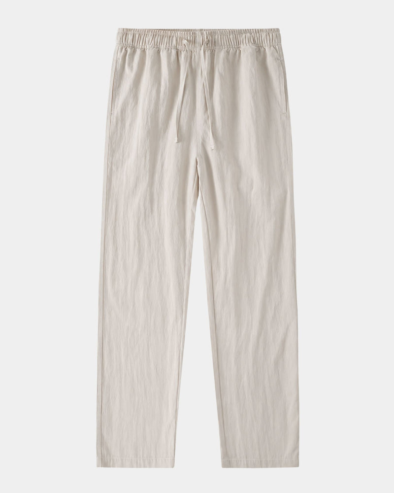 Pantalon crème à cordon de serrage et taille élastiquée, photo produit à plat