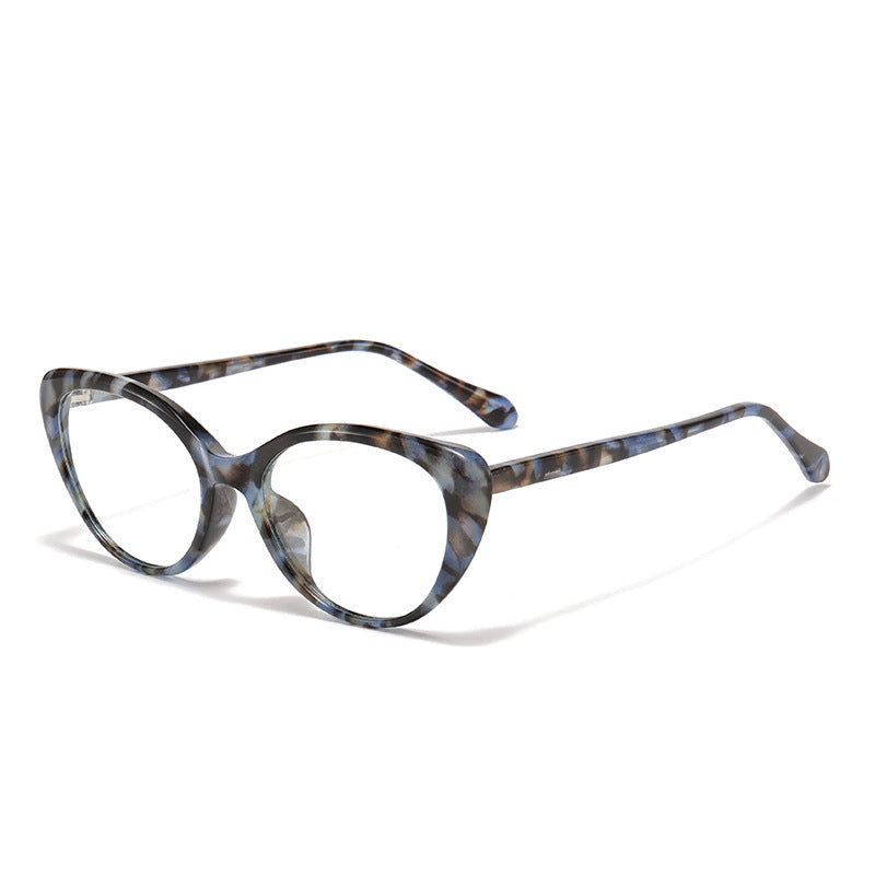 Lunettes à monture œil-de-chat bleue à motifs, verres transparents, photo produit en angle