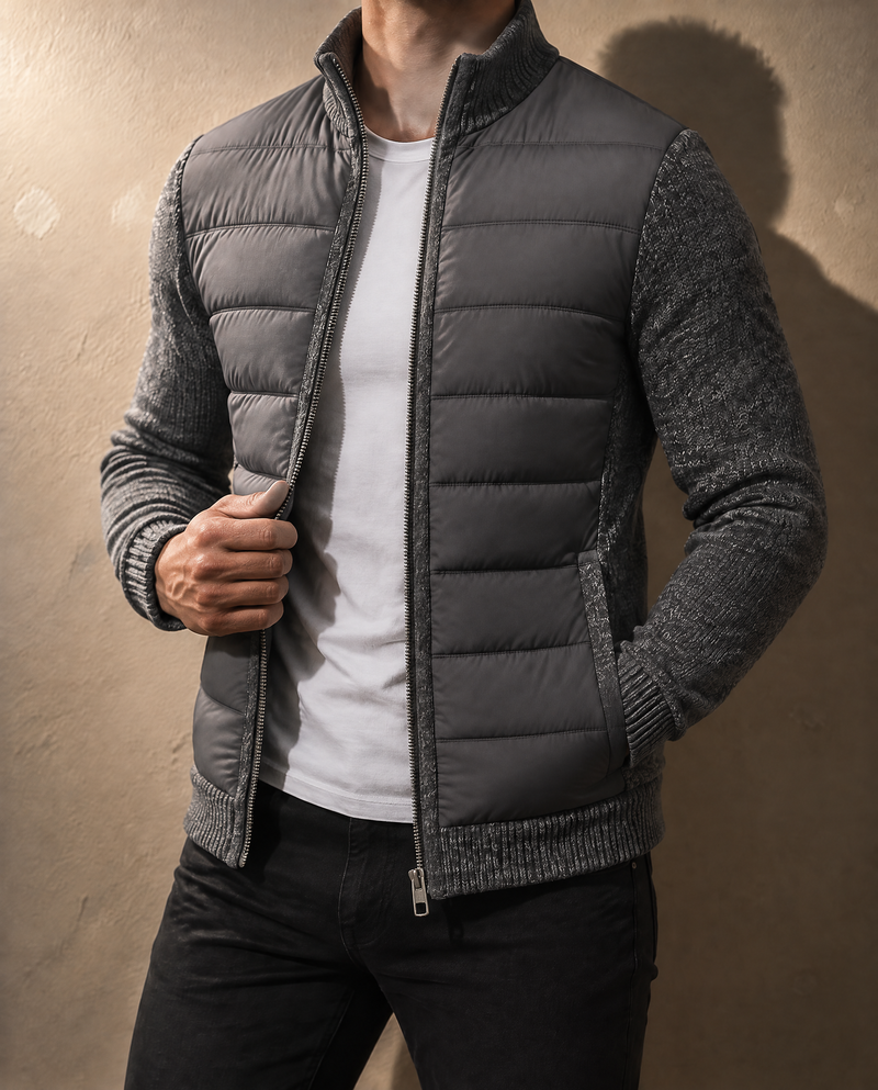 Bellardi Hybrid Puffer Jacket in Dark Grey worn open, a plain white t-shirt visible underneath, hand on the zip pull