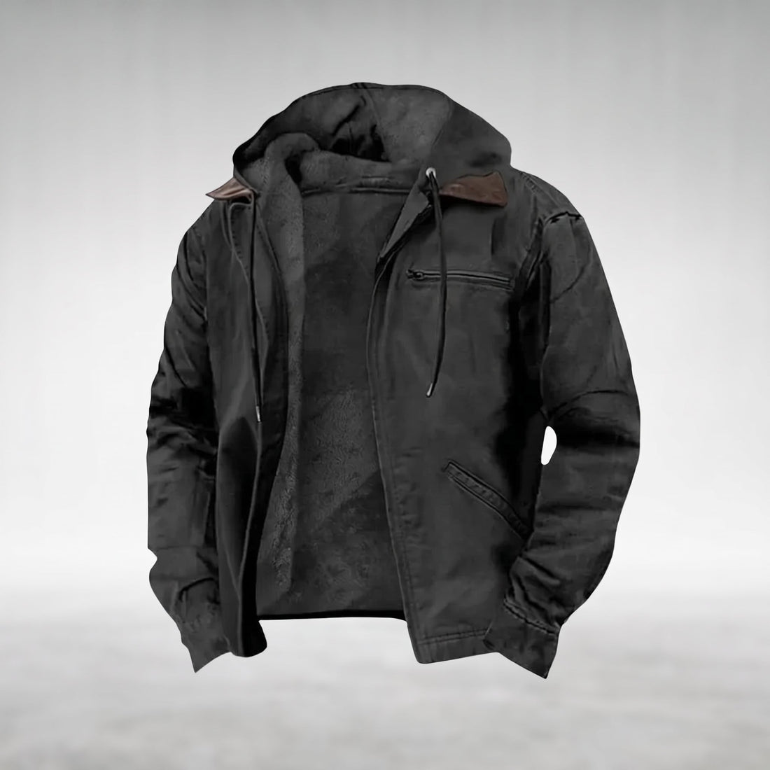 Black Drake hooded jacket, shown open with the silver centre-front zip undone, fixed hood lined in dark plush fleece, dark-brown pointed contrast collar visible at the neckline, two welt pockets on the right front panel, product shot on a plain grey background.