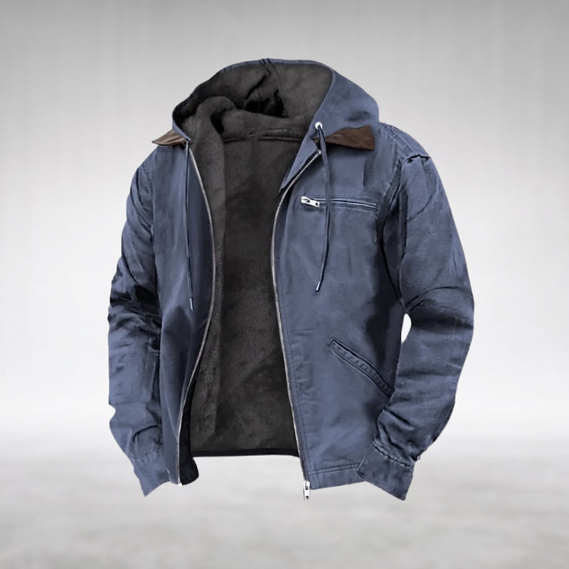 Blue Drake hooded jacket, shown open with the silver centre-front zip undone, fixed hood lined in dark plush fleece, dark-brown pointed contrast collar, two welt pockets on the right front panel, product shot on a plain grey background.